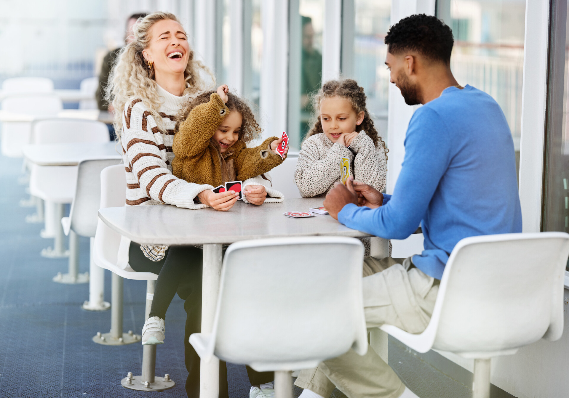 Family Playing UNO on the deck of the Scandlines ferry
