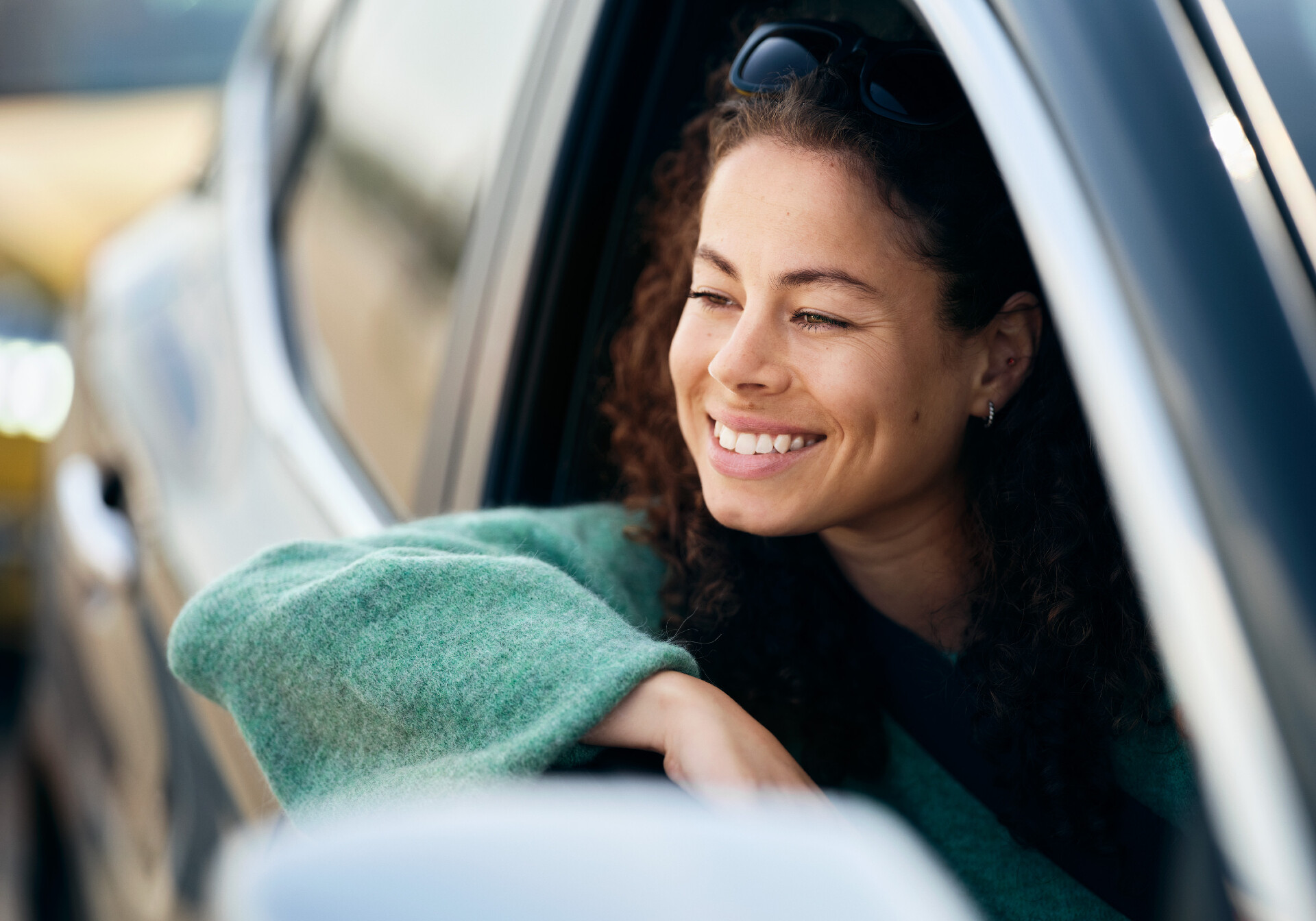 Woman Smiling In A Car