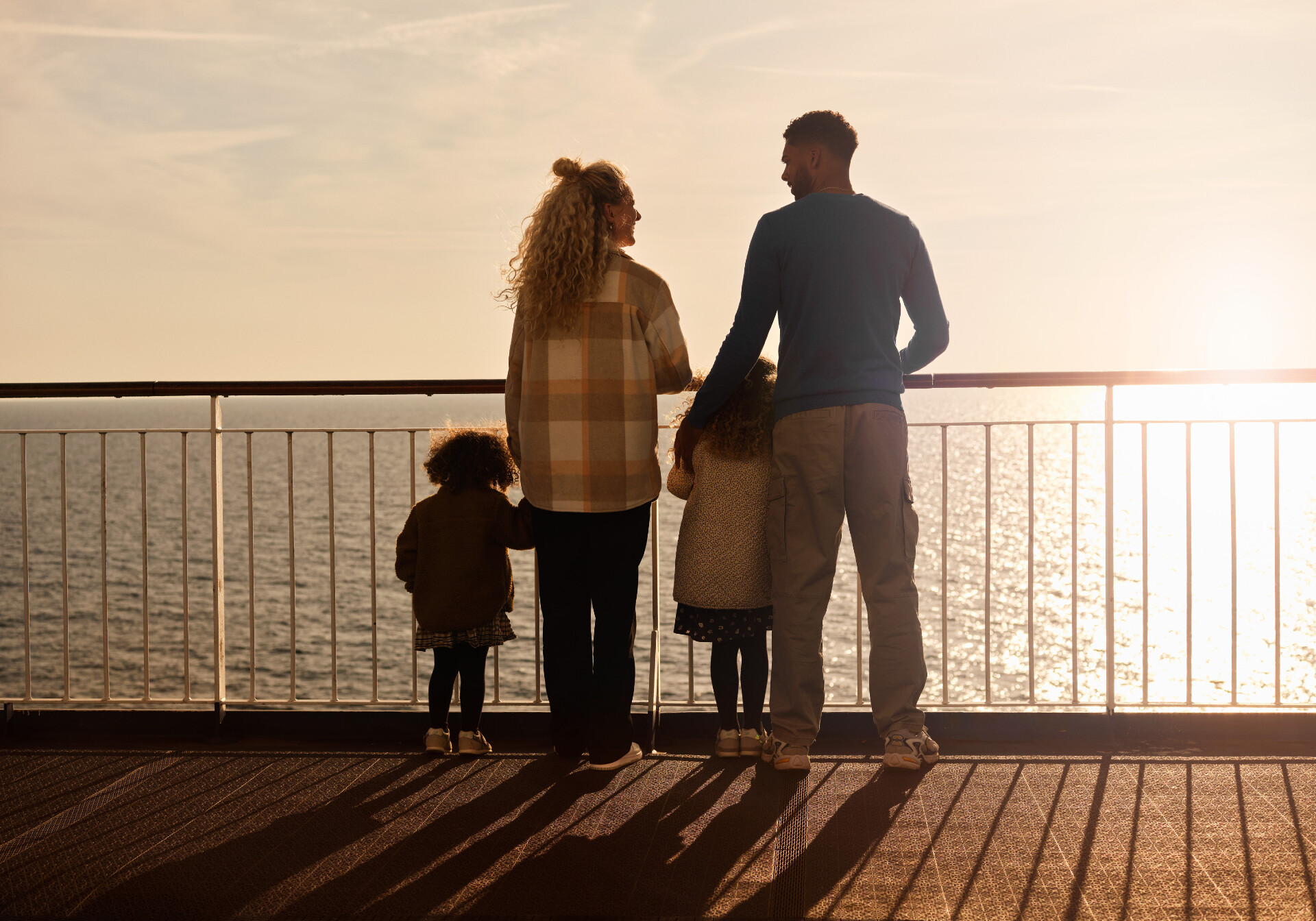 Family Standing On The Deck of the Scandlines hybrid ferry