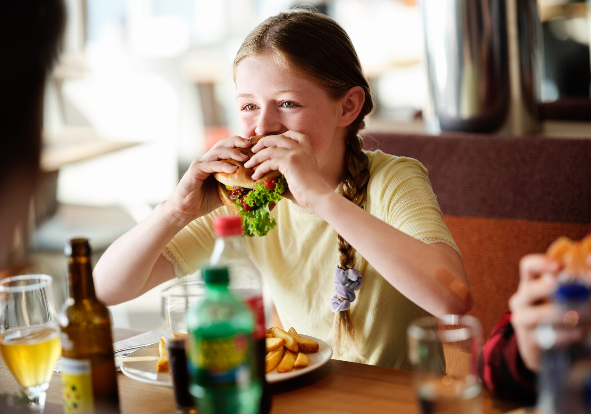 Girl Eating A Burger